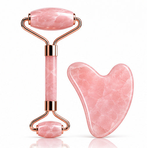 white background matching facial roller and gua sha