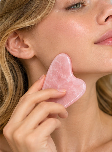 curved gua sha along jaw