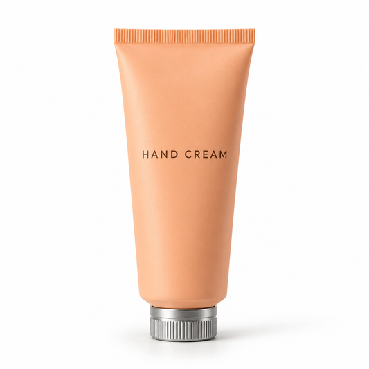 Unbranded apricot hand cream tube on white